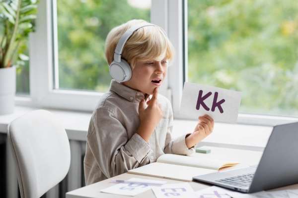 A child decoding words through phonics.