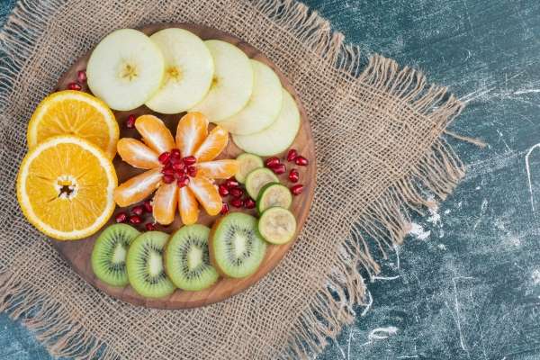 Aerial shot of fruit slices in a pattern.