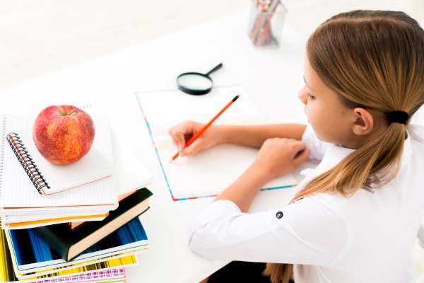 Child sketching apples as a visual representation of  Addition and Subtraction Concepts.