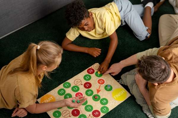 Family engrossed in a board game.