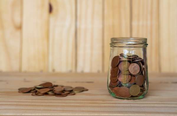 Pennies in a jar illustrating basic  percentages concepts.