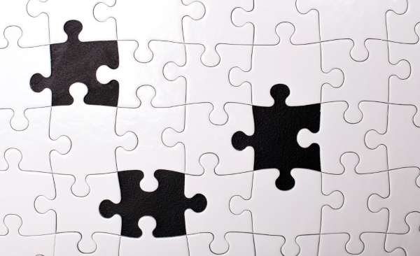 Puzzle pieces representing completion in percentages.