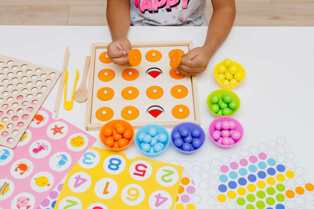 Kid engaging with counting beads for math learning.